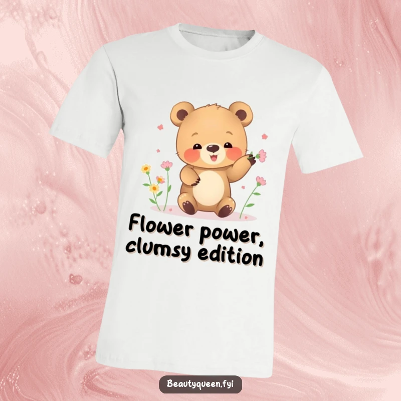 Funny t-shirt of a small bear cub attempting to juggle tiny blooming flowers with a happy expression.